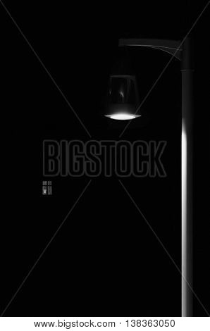 Bright Lit Outdoor Lantern Lamp Pole Post, Lonely Concept Solitude Metaphor, Illuminated Window Light, Vertical Deserted Night Park Scene Closeup, Black Isolated Copy Space Background