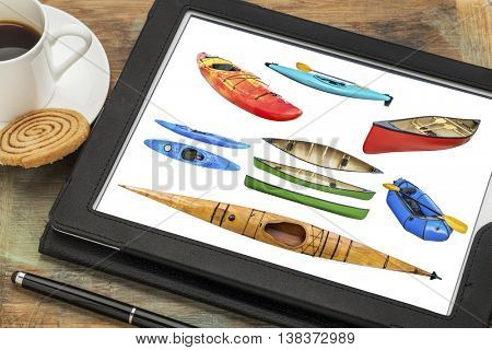 Reviewing isolated pictures of paddling boats (kayak, canoe, raft) on a tablet with cup of coffee. All screen images copyright by the photographer and included at high resolution in the portfolio.