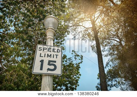Speed Limit sign:15 miles per hour, outdoor