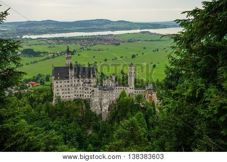 Beautiful view of world-famous Neuschwanstein Castle the 19th century Romanesque Revival palace built for King Ludwig II with scenic mountain landscape near Fussen southwest Bavaria Germany