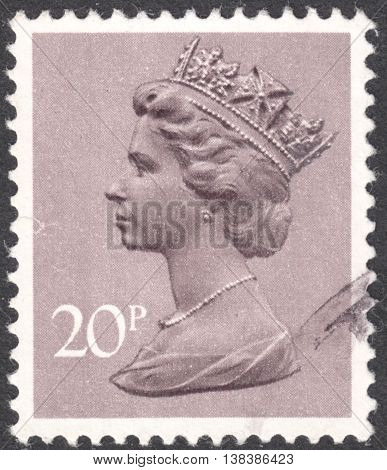 MOSCOW RUSSIA - JANUARY 2016: a post stamp printed in the UNITED KINDOM shows a portrait of Portrait of Queen Elizabeth II circa 1970 - 1977