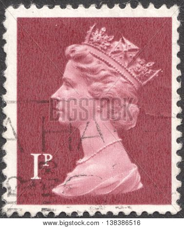 MOSCOW RUSSIA - JANUARY 2016: a post stamp printed in the UNITED KINDOM shows a portrait of Portrait of Queen Elizabeth II circa 1970 - 1977