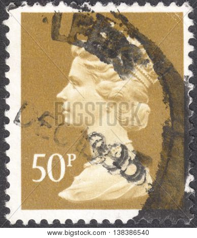 MOSCOW RUSSIA - JANUARY 2016: a post stamp printed in the UNITED KINDOM shows a portrait of Portrait of Queen Elizabeth II circa 1970 - 1977