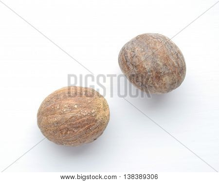 Nutmeg isolated on white background Myristica fragrans