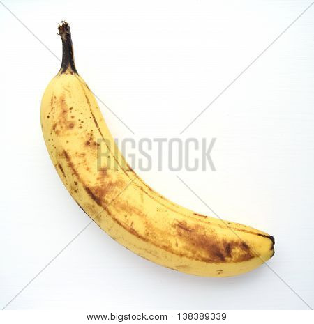 Overripe banana ready to eat isolated on white background