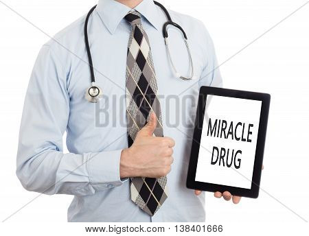 Doctor Holding Tablet - Miracle Drug