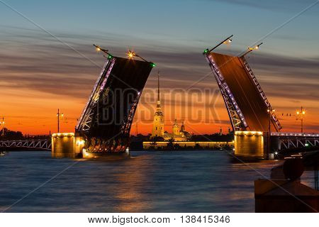 Open Palace Bridge and view of the Peter and Paul Fortress in St.Petersburg in white night