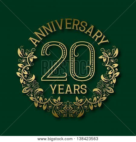 Golden emblem of twentieth years anniversary. Celebration patterned logotype with shadow on green.