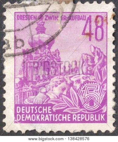 MOSCOW RUSSIA - JANUARY 2016: a post stamp printed in DDR shows Zwinger with inscription “Dresden Zwinger construction” the series 