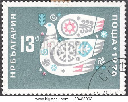 MOSCOW RUSSIA - CIRCA JANUARY 2016: a post stamp printed in BULGARY shows a symbol of Peace - a dove the series 