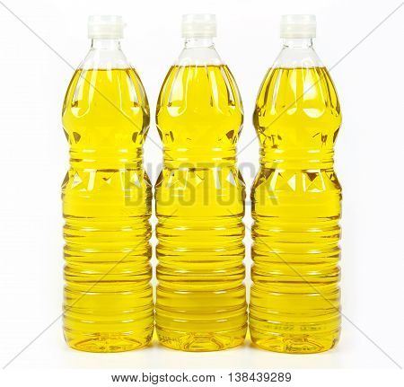 three bottles oil of refined palm oil from pericarp