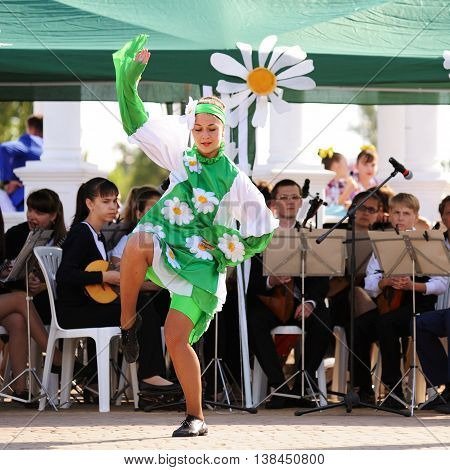 Orel Russia - July 08 2016: Russian Valentine Day - Petr and Fevronia. Girl daincing in daisy dress with orchestra