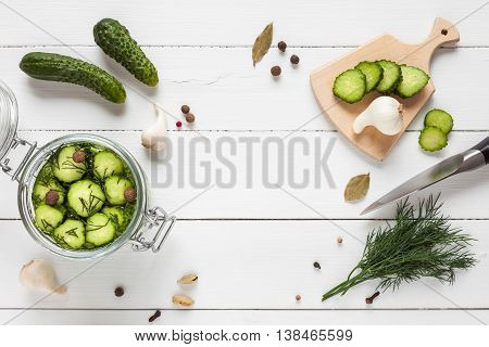 Cucumbers Ready For Pickling And Ingredients On White Table.