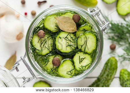 Pickled Cucumbers Closeup In A Jar. Top View. Homemade Vegetable Canning.