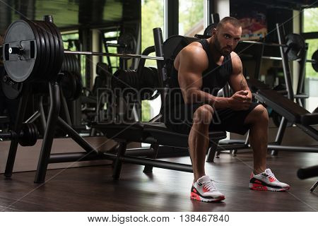 Muscular Man Resting On The Bench