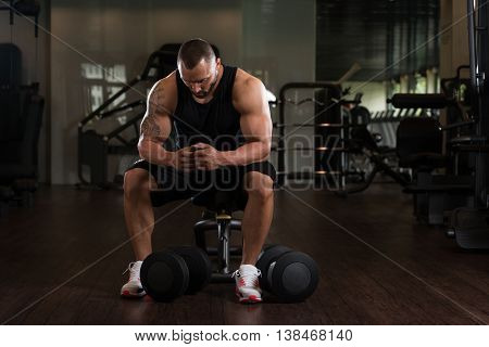Bodybuilder Resting In Healthy Club