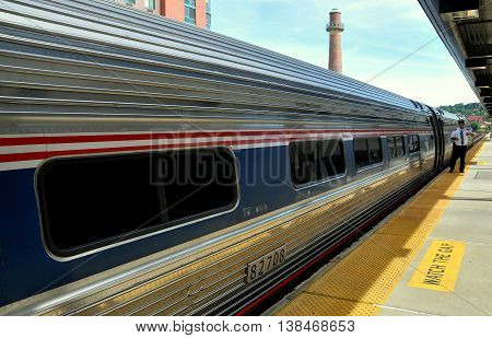 Yonkers New York - August 6 2012: AMTRAK passenger train stopped at the Yonkers train station