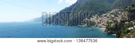POSITANO ITALY - JUNE 27: Long Panorama of Positano Town on JUNE 27 2014. Picturesque Amalfi Coast Panoramic Landscape in Positano Italy.