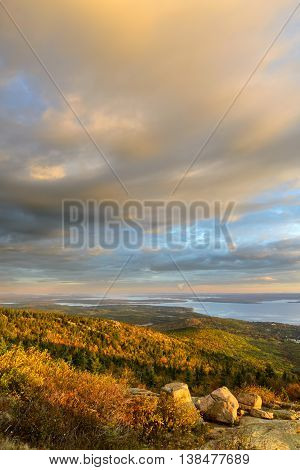 Scenic View of Fall Trees and Ocean Inlet with Colorful Morning Sky