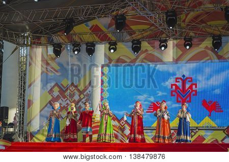 Cheboksary, Chuvashia, Russia - June 24, 2016: Day holiday of the Republic of Chuvashia - Folk group sing in national costumes from scene