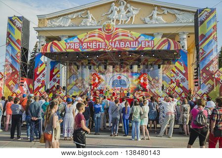 Cheboksary, Chuvashia, Russia - June 24, 2016: Day holiday of the Republic of Chuvashia - people watch perfomance on scene