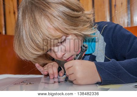 Boy With Long Blond Hair