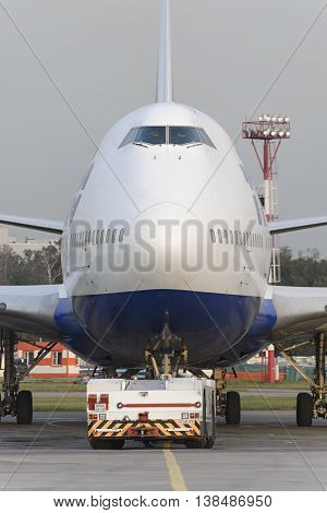 MOSCOW, RUSSIA - SEPTEMBER 26, 2014: Boeing 747 Transaero towed to the runway. Transaero Airlines has ceased to exist in 2015.