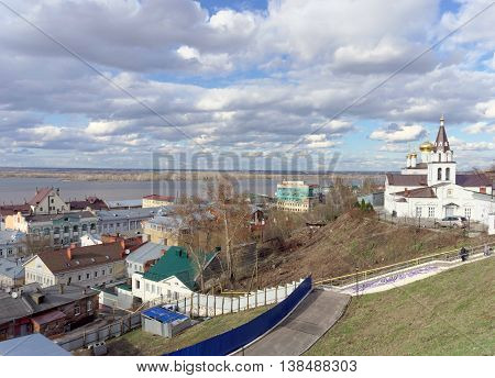 View from the high bank of the Oka River in the street Christmas and Church of Elijah the Prophet