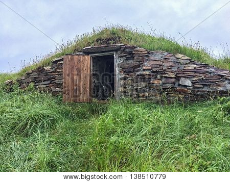 Root Cellar with Open Door in Newfoundland