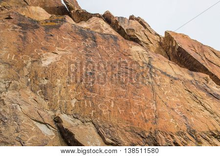 Petroglyphs on the stone in Tamgaly Kazakhstan