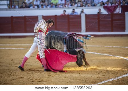 Pozoblanco Spain - September 24 2010: The Spanish Bullfighter Juan Jose Padilla bullfighting with the crutch in the Bullring of Pozoblanco Spain