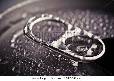 Close Up Opened Aliminium Jar With Water Drops