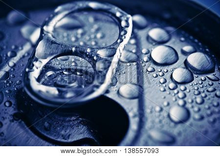 Close Up Opened Aliminium Jar With Water Drops
