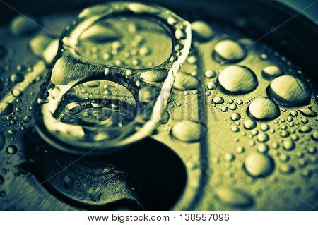 Close Up Opened Aliminium Jar With Water Drops
