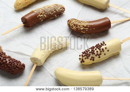 Banana Covered In Chocolate On A Pergament