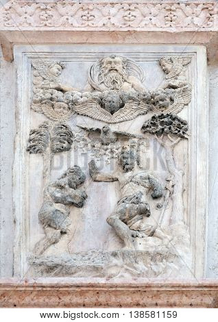 BOLOGNA, ITALY - JUNE 04: Baptism of Christ by Lazzaro Casario, right door of San Petronio Basilica in Bologna, Italy, on June 04, 2015