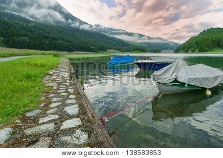 Lmountain Ake With Boats  In Engadin Valley In Swiss