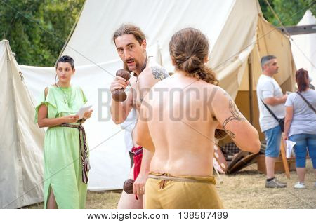Monterenzio Italy 09 July 2016 - two long haired fighters having a duel during a Celtic festival