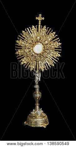 A Catholic priest santisimo host at Communion