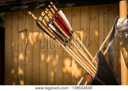 A Leather Quiver With Arrows In It.