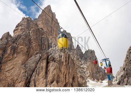 Nice colorful cable car in the Dolomites Italy. (Monte Cristallo massif near to Cortina)