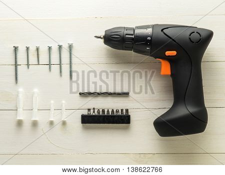 Handy man picture frame installation equipment. Driller Screwdriver for photo frame installing.