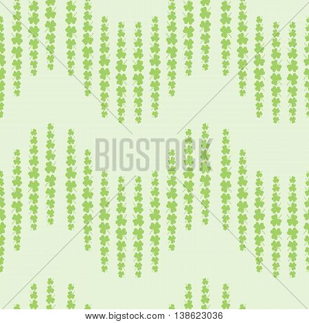 Nice pattern with clover leaves on green background