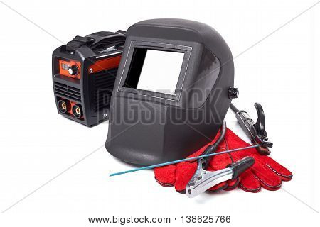 Inverter welding machine, welding equipment, isolated on a white background, welding mask, leather gloves, welding electrodes, high-voltage wires with clips, set of accessories for arc welding.