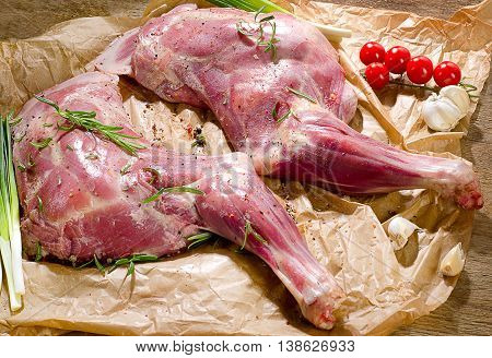 Raw Lamb Shanks Ready For Frying On A Wooden Board.