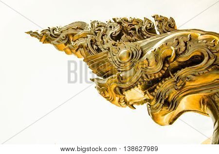 Spinning Naga Asia Thailand golden sky historical heritage white background.