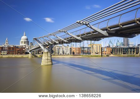 Millennium Bridge with St Pauls across River Thames