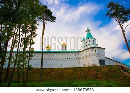 Novospassky Monastery. New Monastery Of The Saviour. Fortress Wall Against The Evening Sky. Russia.