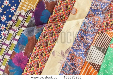 Patchwork quilt. Part of patchwork quilt as background. Flower print. Color blanket in style patchwork. Color blanket. Handmade.