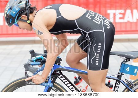 STOCKHOLM - JUL 02 2016: Front view of female triathlete cyclist Ai Ueda Japan in the Women's ITU World Triathlon series event July 02 2016 in Stockholm Sweden